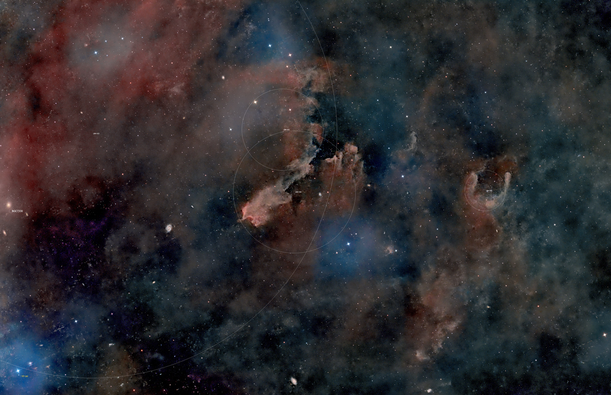 The nebulae LBN 435, LBN438, also called sandworm nebula and LBN440 belong to the molecular cloud Lacerta 10. It is a combination of a dark cloud (interstellar dust that blocks the light of the stars behind it) and a weak reflection nebula.